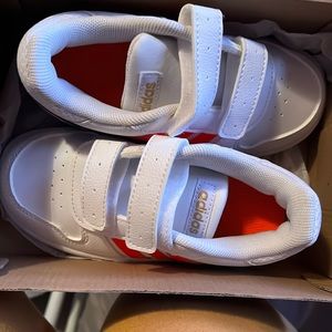 Brand new Velcro Adidas never worn